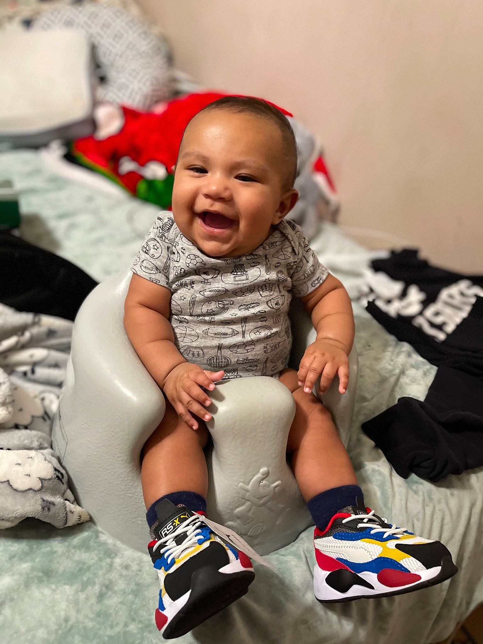 Sebastian joined the competition — help win amazing prizes! baby, baby_toddler_clothing, event, finger, foot, fun, happy, headgear, human, human_body, human_leg, knee, person, sitting, sleeve, smile, sock, t_shirt, thigh, toddler