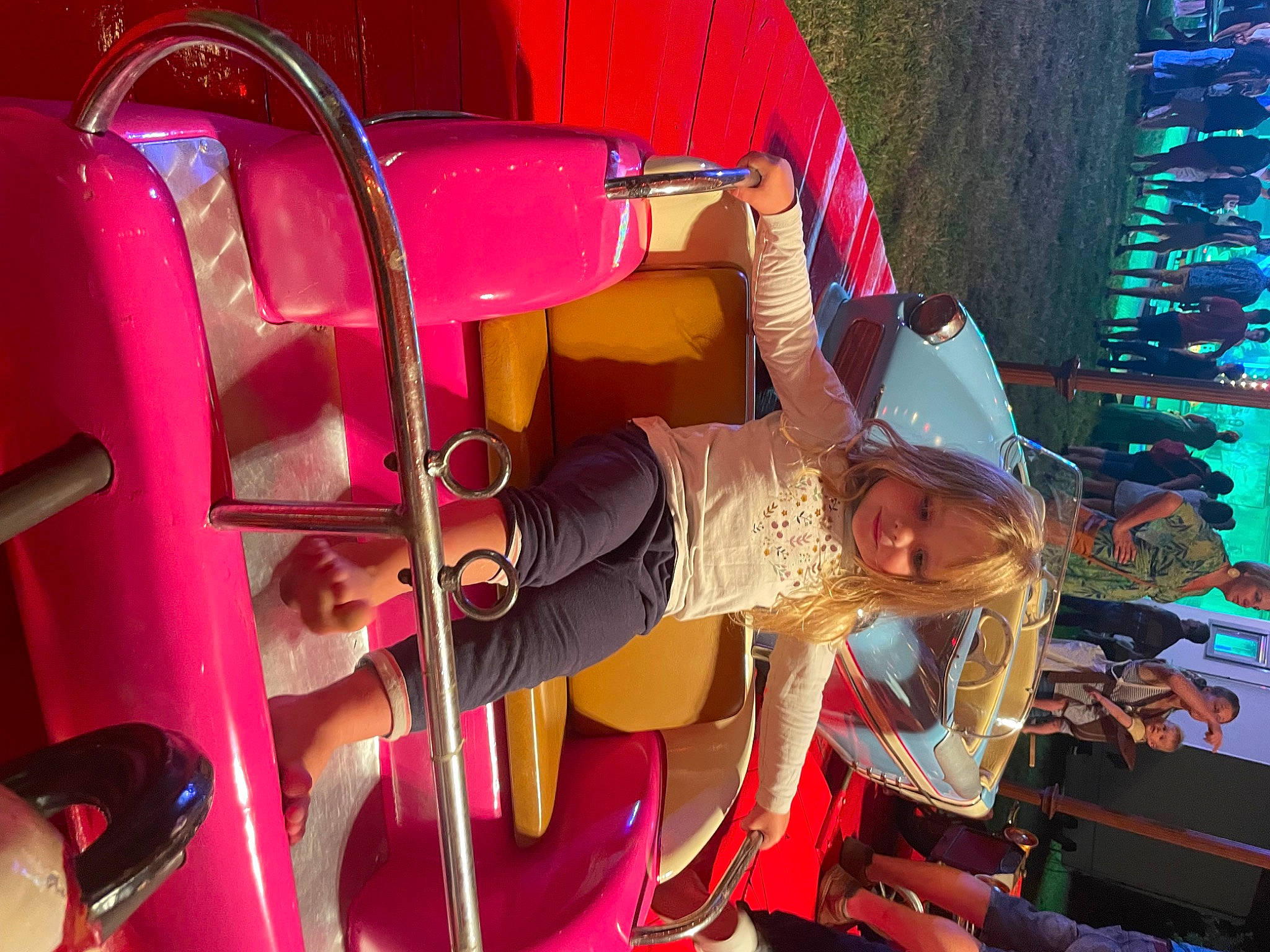 Liya participe au concours pour gagner de l'argent avec cette photo : child, entertainment, event, fun, hat, leisure, magenta, person, pink, public_event, purple, recreation, room, sandal, shorts, sun_hat, tree, vacation