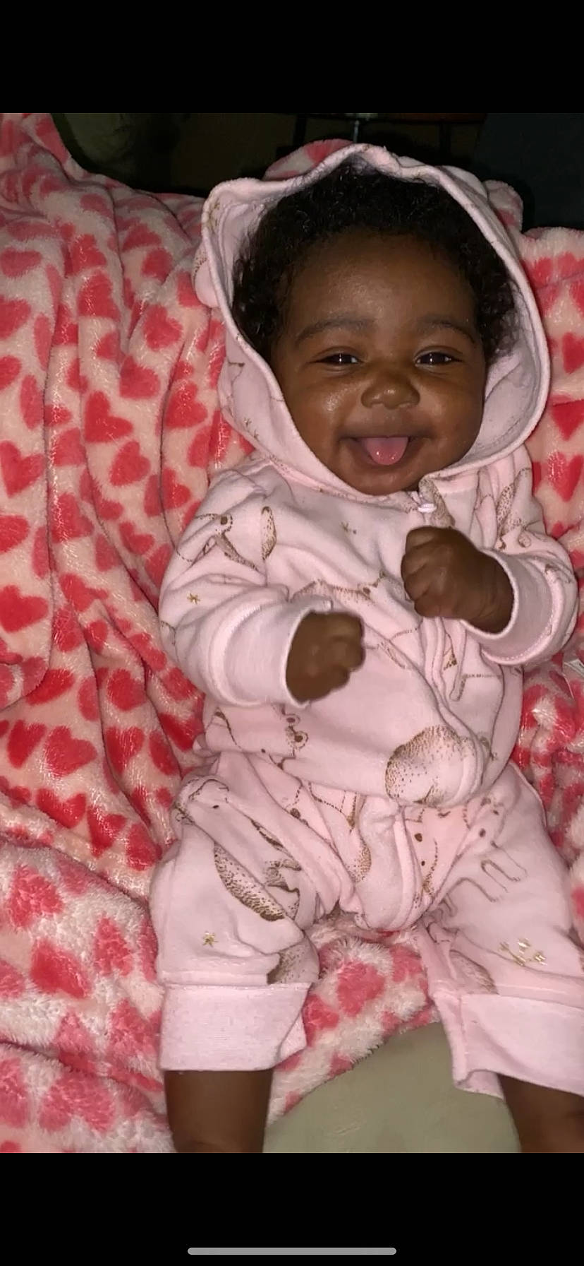 Kylar joined the competition — help win amazing prizes! baby, baby_toddler_clothing, cheek, child, comfort, eye, face, facial_expression, fun, happy, linens, pattern, person, pink, skin, sleeve, smile, textile, thumb, toddler