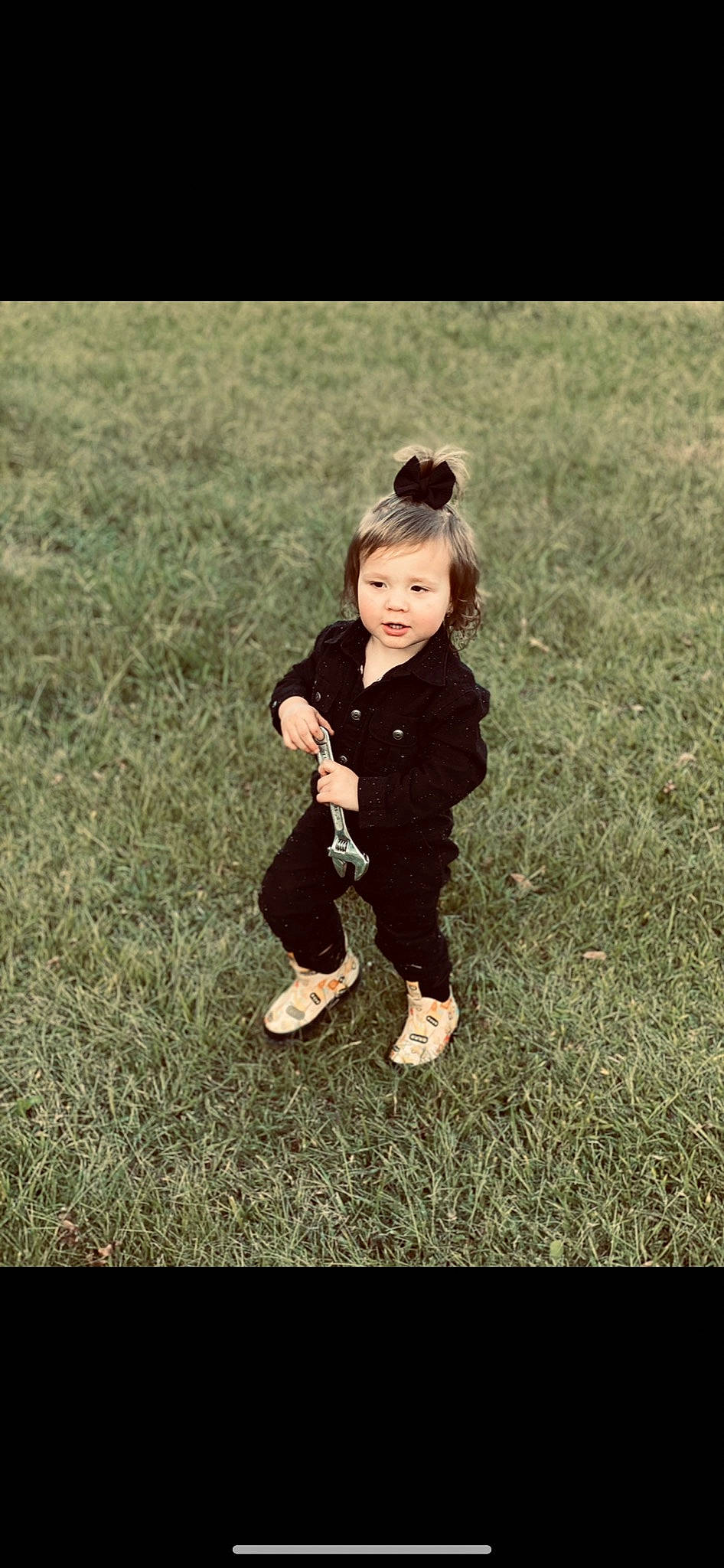 Raylee is registered to the contest to win money with this photo: child, dress, grass, happy, leg, people, person, photography, plant, play, shoe, sitting, smile, snapshot, standing, toddler, tree