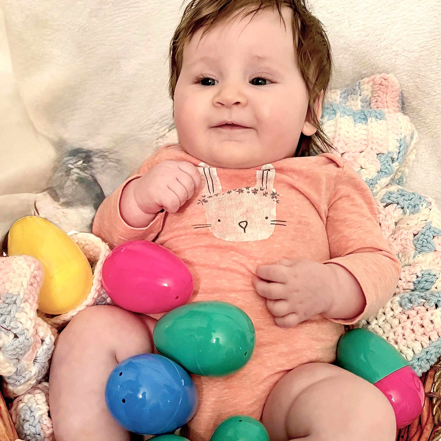 Aurora is registered to the contest to win money with this photo: baby, balloon, basket, bodypart, couch, egg, face, finger, food, furniture, hand, happy, head, newborn, person, photography, portrait, sitting, smile, sweets