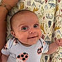 Charley joined the competition — help win amazing prizes! baby, infant, smiling, face, person, arm, tattoo, ring, bracelet, clothing, onesie, ladybug_pattern, blanket, animal_print, zebra, giraffe, leaf_pattern, indoor, cute, child