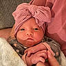 Sadie joined the competition — help win amazing prizes! baby, baby_face, blanket, closeup, clothing, cozy, cute, finger, hand, headwear, indoors, infant, newborn, newborn_clothes, person, pink_bow, portrait, sleepwear, soft_texture, warm_colors