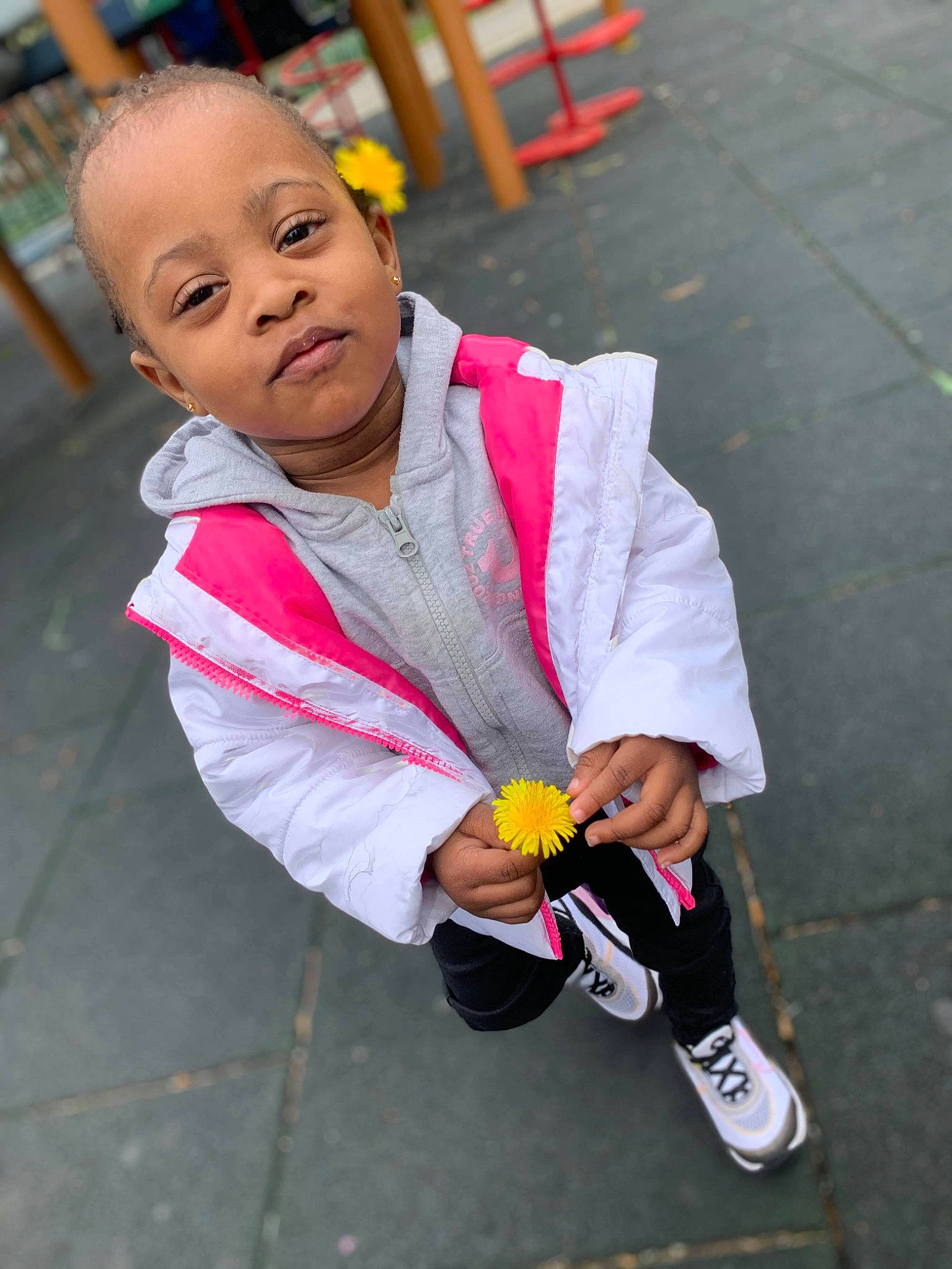 Kehlani joined the competition — help win amazing prizes! asphalt, chair, child, event, eyewear, fun, happy, human_leg, leisure, pedestrian, person, recreation, road, road_surface, sitting, skateboard_truck, street, toddler, tourism, tradition