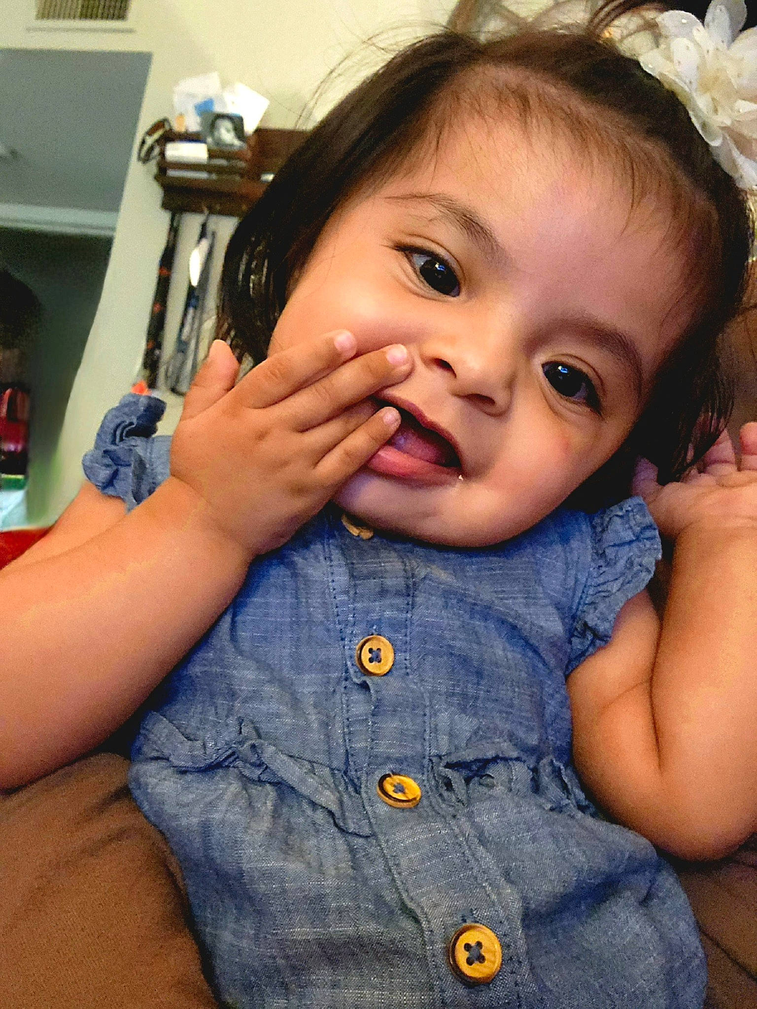 Alicia is registered to the contest to win money with this photo: arm, baby_toddler_clothing, cheek, chin, ear, eye, eyelash, face, finger, gesture, hairstyle, hand, iris, lip, mouth, neck, nose, person, skin, sleeve