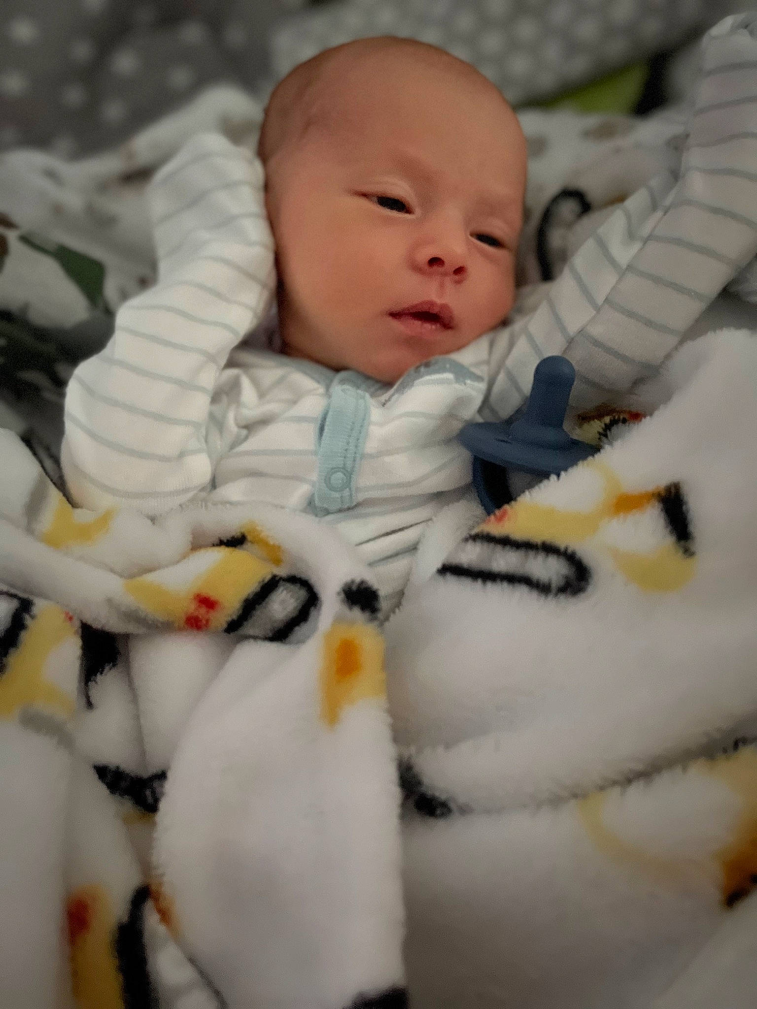 Jonas is registered to the contest to win money with this photo: baby, baby_sleeping, baby_toddler_clothing, cheek, child, comfort, fur, happy, linens, pattern, person, portrait_photography, room, toddler, toy, winter