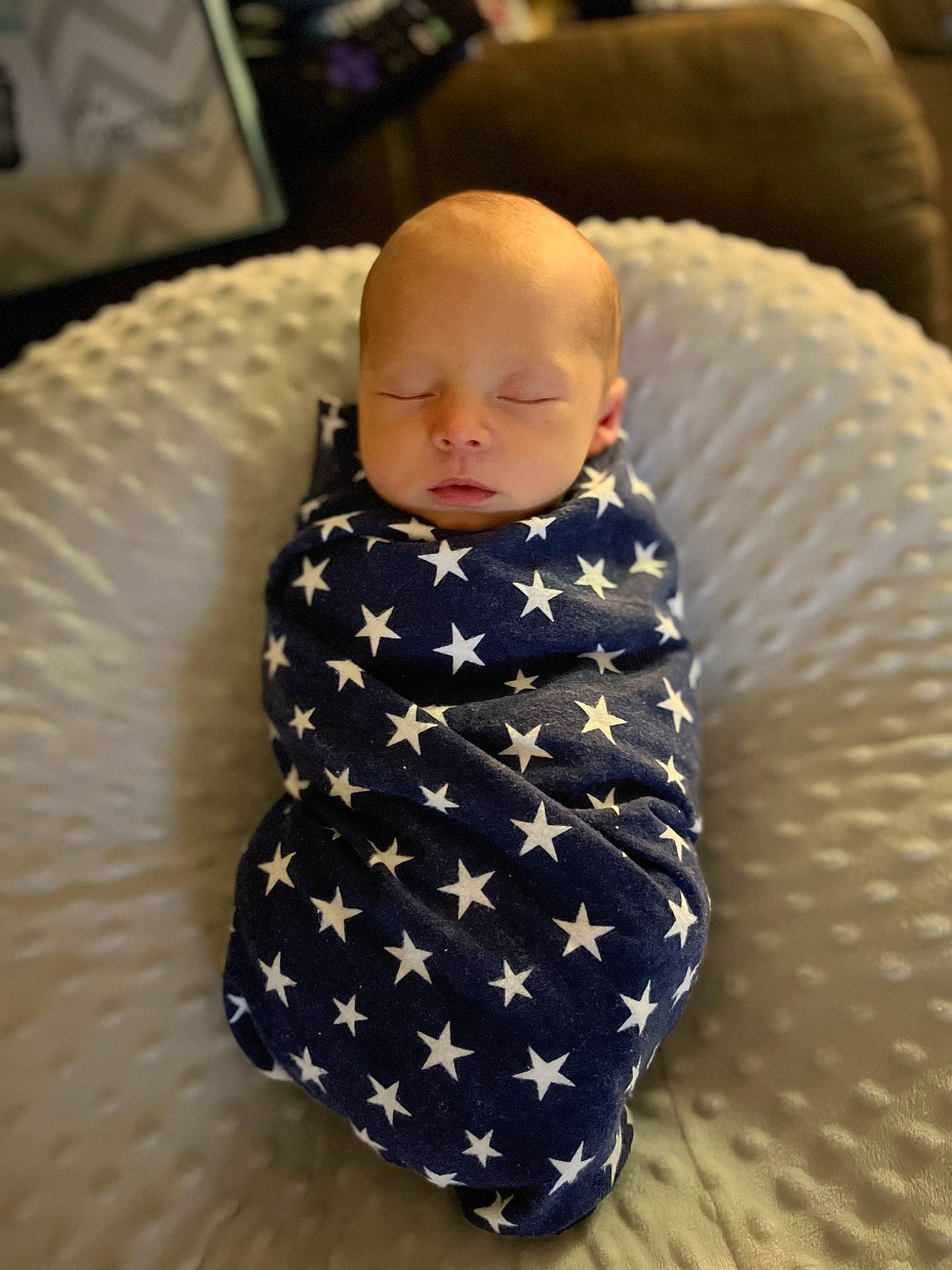 Jonas joined the competition — help win amazing prizes! baby, baby_products, baby_sleeping, baby_toddler_clothing, carmine, child, collar, comfort, electric_blue, flooring, human_body, linens, pattern, person, play, room, sitting, sleeve, toddler