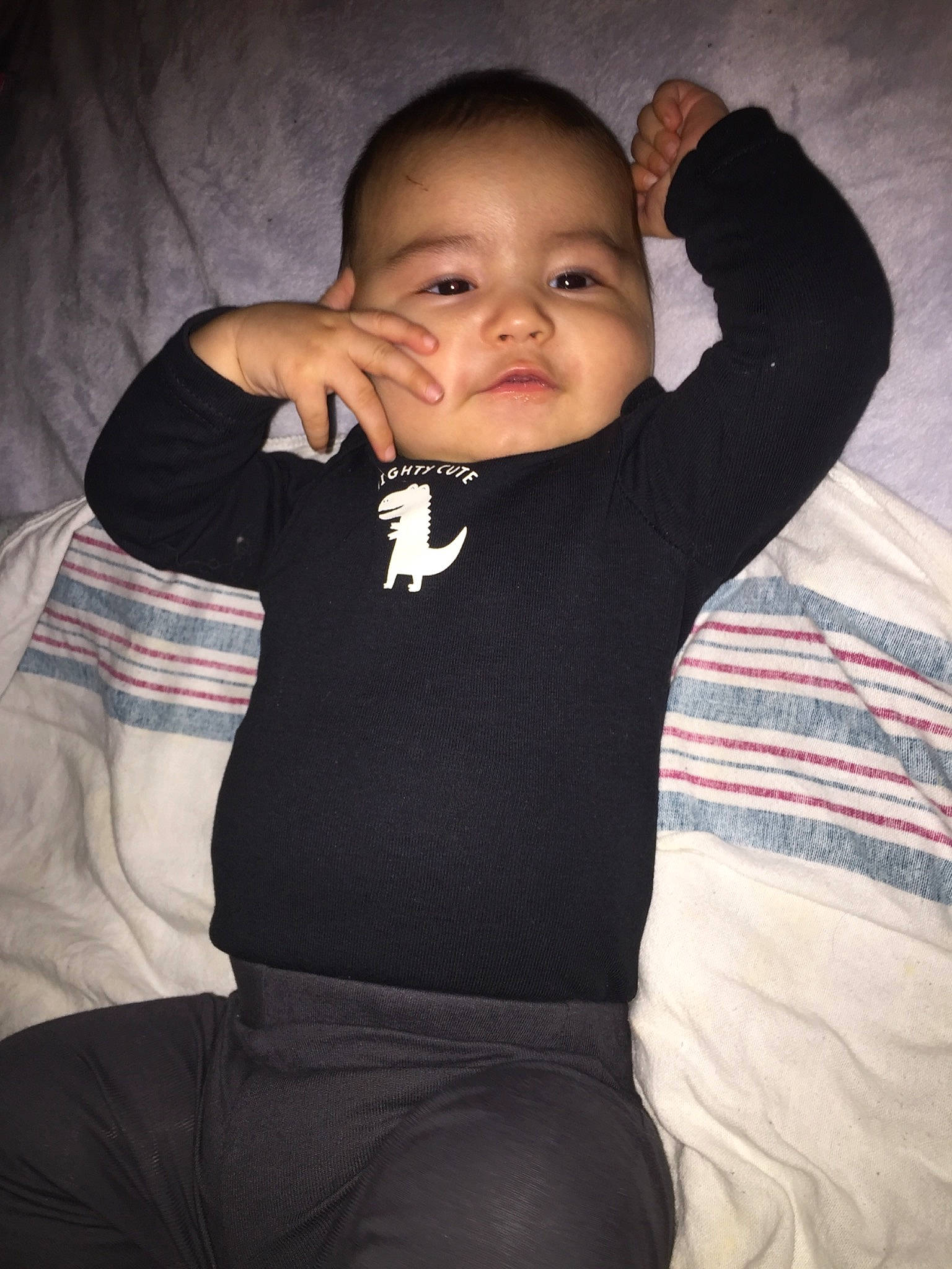 Alias is registered to the contest to win money with this photo: arm, baby, black, cheek, child, cool, eye, face, head, joint, leg, mouth, muscle, neck, nose, person, shoulder, skin, smile, t_shirt