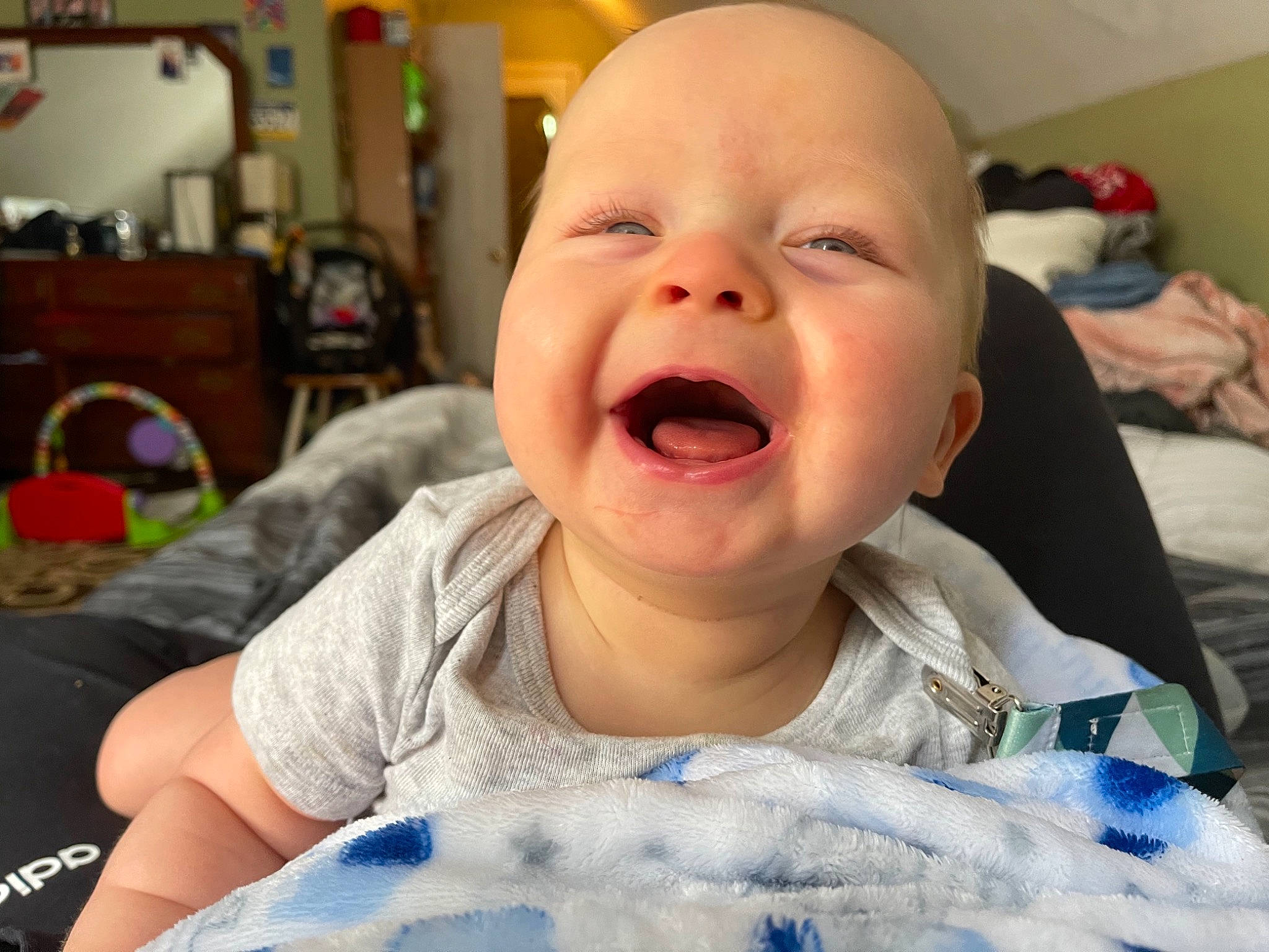 Emmett is registered to the contest to win money with this photo: baby, baby_laughing, baby_toddler_clothing, cheek, child, comfort, eyebrow, finger, fun, happy, iris, lip, mouth, nose, person, skin, sleeve, smile, t_shirt, toddler