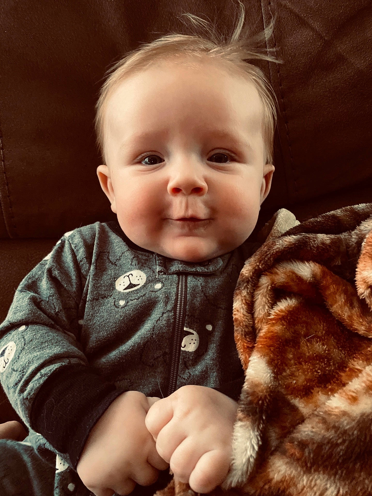 Eastyn is registered to the contest to win money with this photo: baby, baby_toddler_clothing, cheek, child, chin, clothing, comfort, cool, finger, flash_photography, gesture, hand, happy, iris, nose, person, sitting, skin, sleeve, toddler