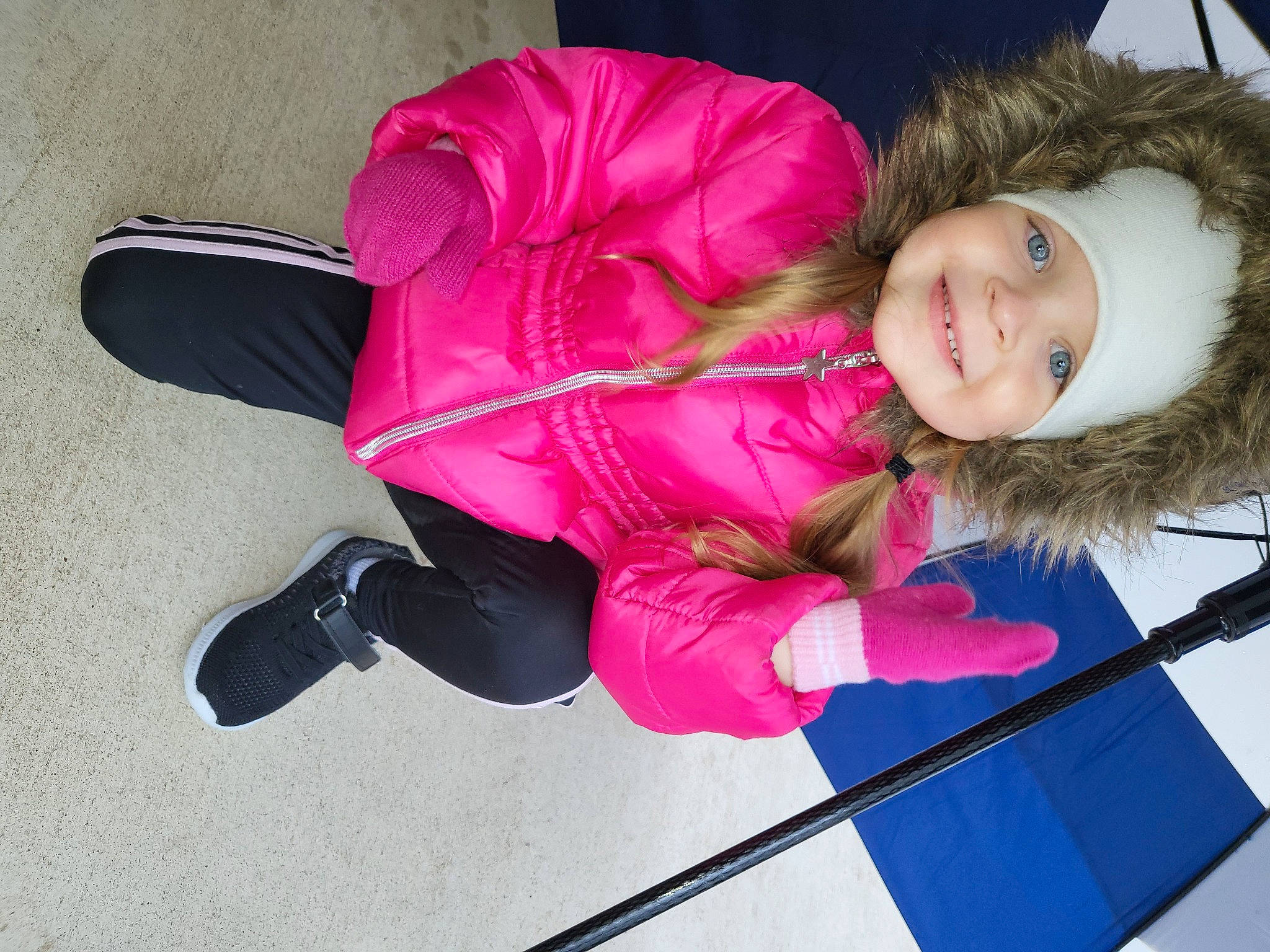 Dixie joined the competition — help win amazing prizes! baby_toddler_clothing, carmine, cheek, child, comfort, electric_blue, fun, fur, glove, happy, headwear, jacket, joy, leisure, magenta, parka, person, recreation, sitting, smile