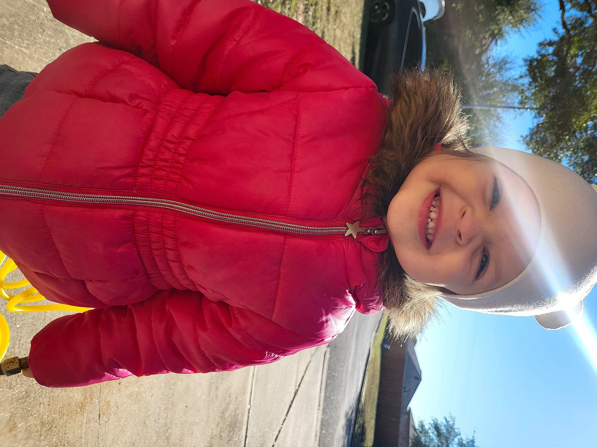 Dixie joined the competition — help win amazing prizes! child, comfort, electric_blue, flash_photography, fun, fur, grass, happy, headwear, jacket, joy, leisure, magenta, people_in_nature, person, plant, recreation, red, sky, smile