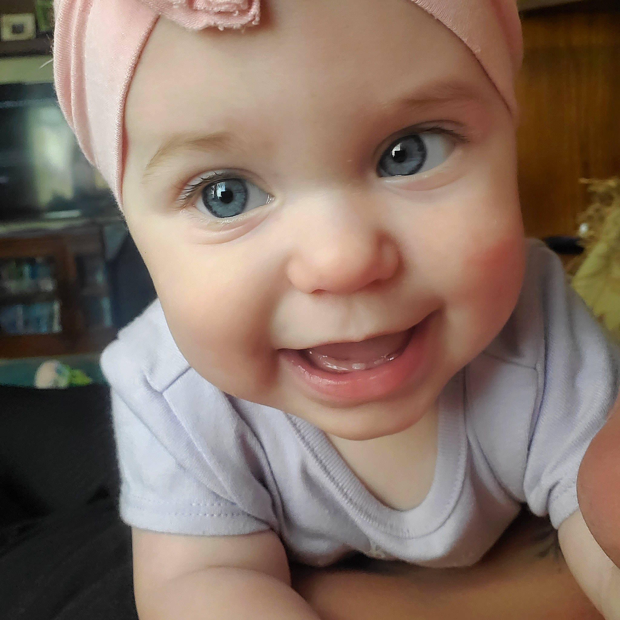 Bonnie is registered to the contest to win money with this photo: baby, baby_toddler_clothing, cheek, clothing, cool, ear, eyelash, finger, grass, happy, headwear, iris, jaw, joy, lip, mouth, nose, person, product, skin