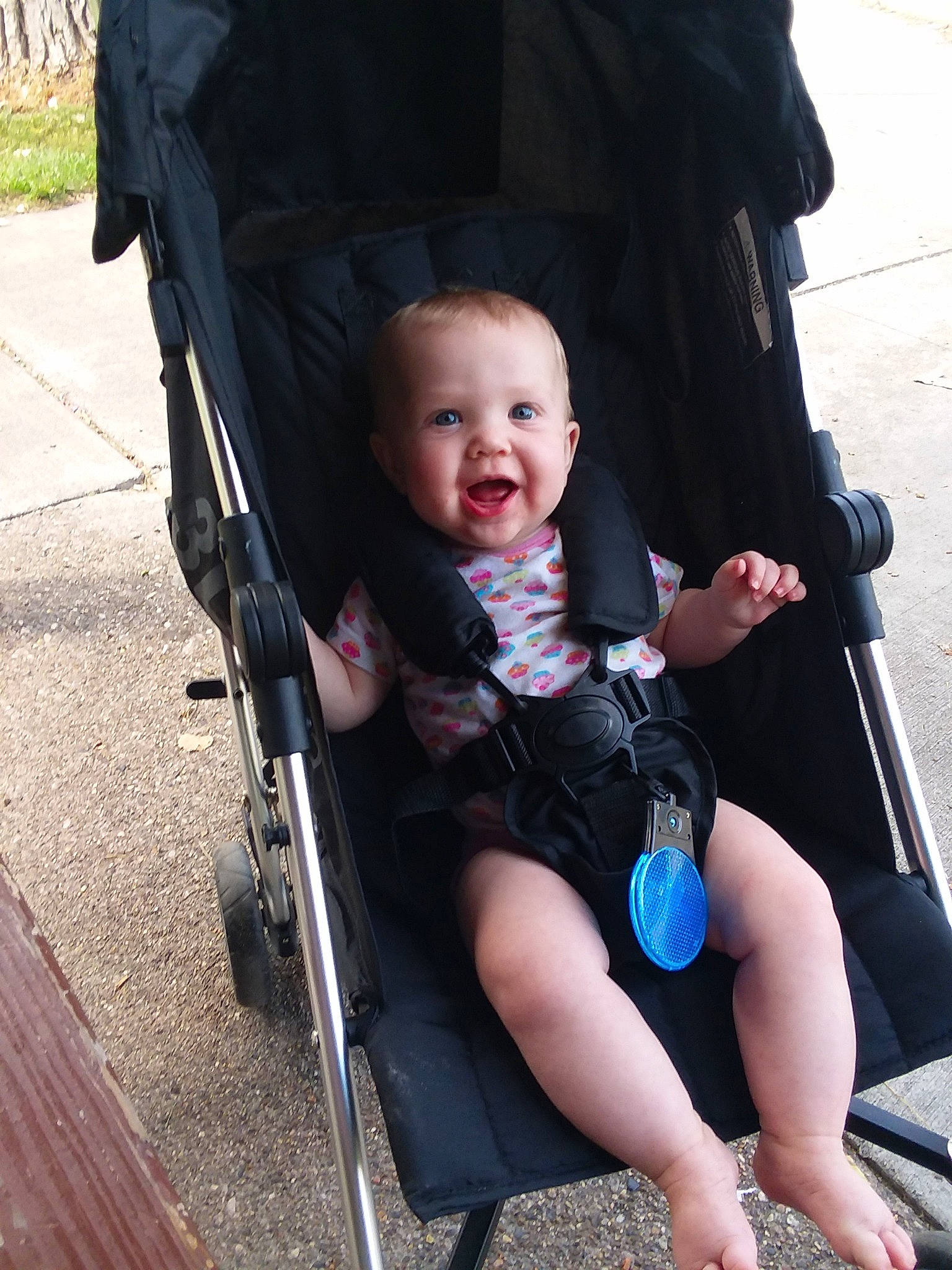 Eretria is registered to the contest to win money with this photo: baby, baby_carriage, baby_products, child, leg, person, product, sitting, smile, toddler, vacation