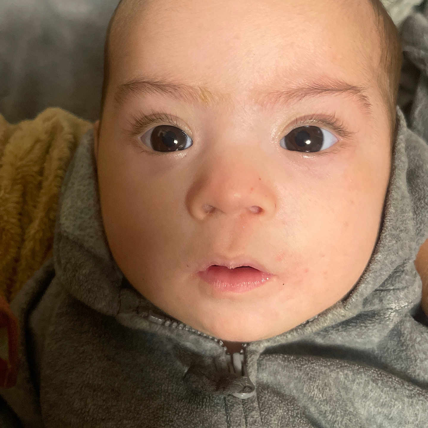 Amine joined the competition — help win amazing prizes! baby, child, closeup, clothing, cute, expression, eyes, fabric, face, head, hoodie, indoors, infant, person, portrait, skin, soft, texture, warm, young