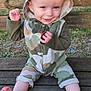 child, toddler, smiling, hoodie, camouflage, outdoor, bench, wood, grass, happy, person, cute, sitting, portrait, baby, clothing, feet, face, casual, playful