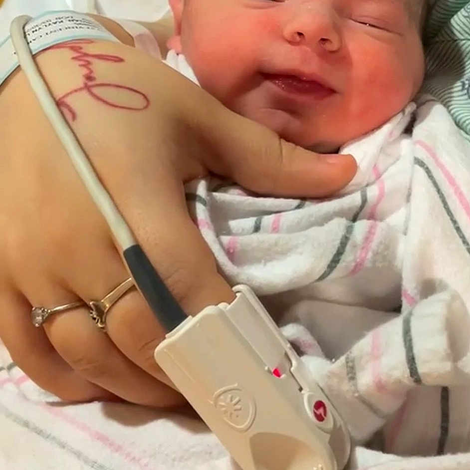 Delilah Rose joined the competition — help win amazing prizes! architecture, baby, blanket, building, childbirth, clothing, face, glove, head, hospital, newborn, person, photography, portrait, smokepipe