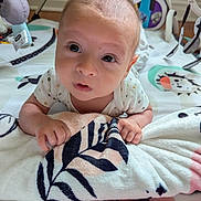 Alexander joined the competition — help win amazing prizes! baby, infant, blanket, hands, face, eyes, toy, playmat, floor, indoor, child, cute, young, person, portrait, soft, clothing, head, expression, curious