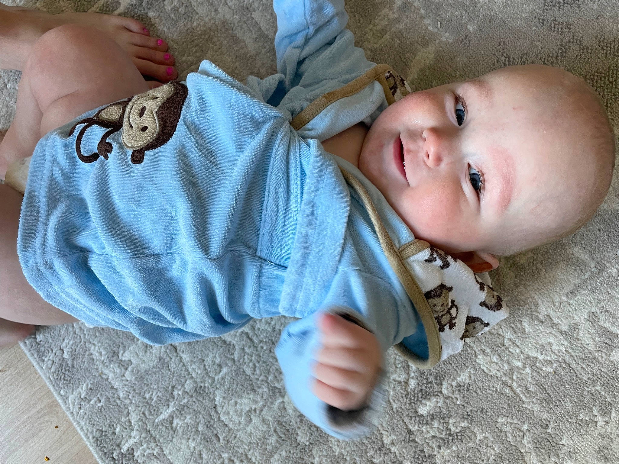Carter joined the competition — help win amazing prizes! baby, baby_toddler_clothing, cheek, child, comfort, finger, flooring, grass, hand, happy, human_body, mouth, nose, pattern, person, sitting, skin, sleeve, smile, toddler