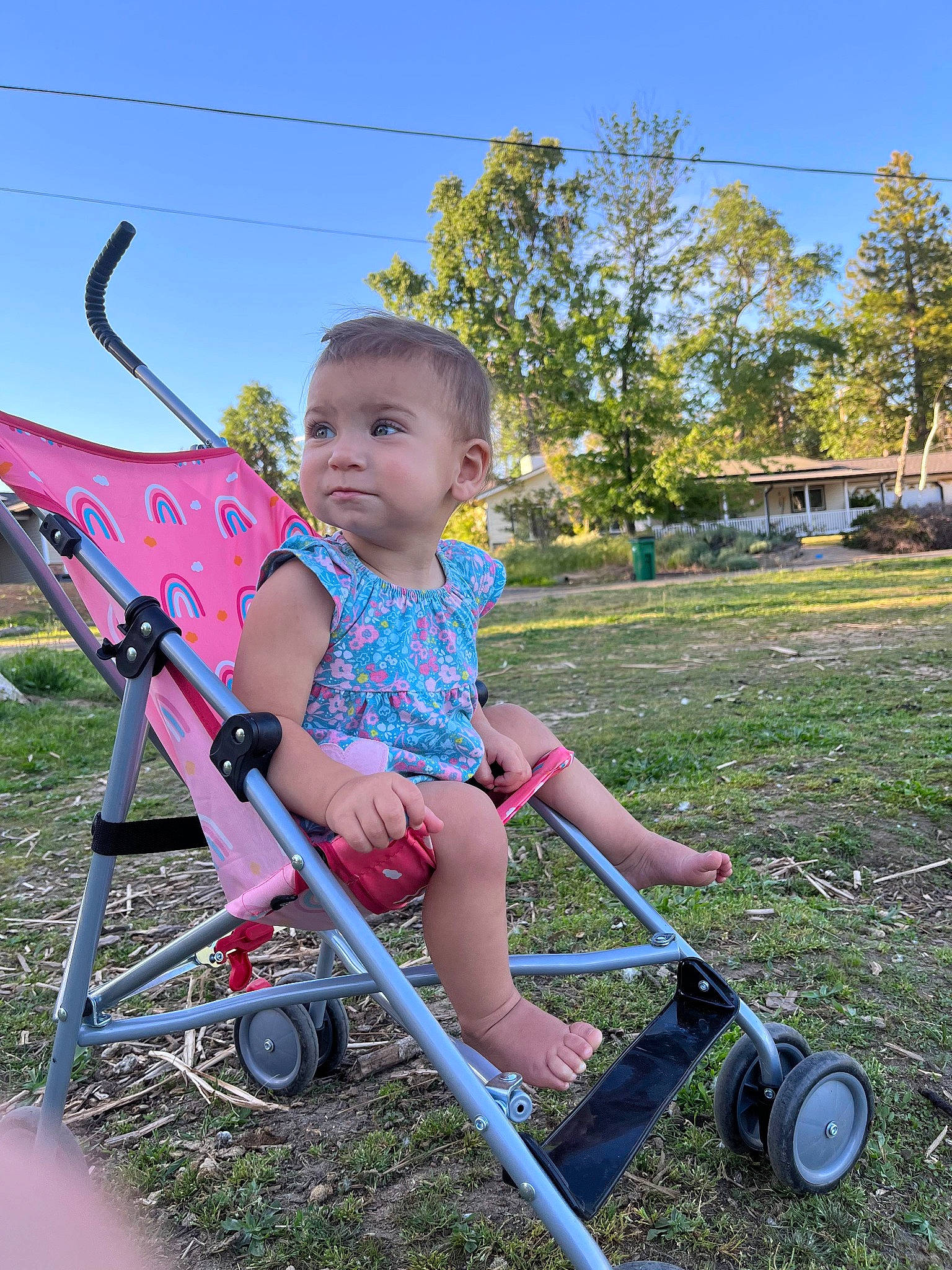 Harper joined the competition — help win amazing prizes! automotive_wheel_system, baby, baby_toddler_clothing, child, electric_blue, fun, grass, grassland, lawn, leisure, people_in_nature, person, plant, recreation, sitting, sky, tire, toddler, tree, wheel