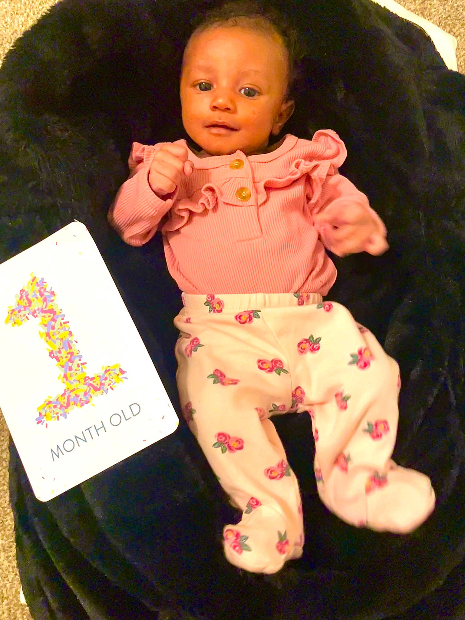 Royale is registered to the contest to win money with this photo: baby, baby_products, baby_toddler_clothing, bedding, cheek, child, comfort, fun, happy, linens, pattern, peach, person, pillow, pink, play, room, sitting, sleeve, smile