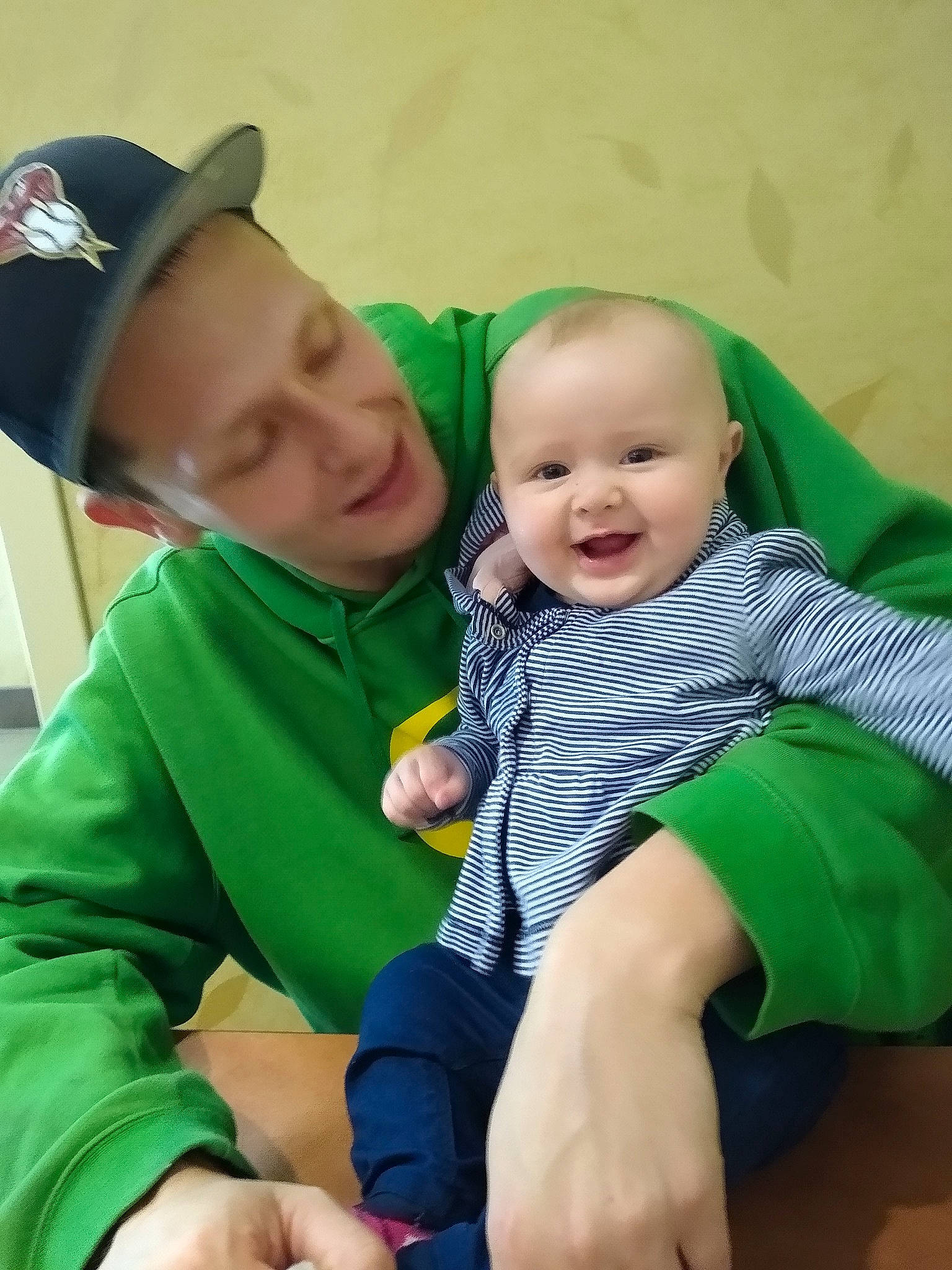 Raiven joined the competition — help win amazing prizes! arm, baby, child, finger, fun, gesture, green, hand, happy, headgear, joy, leg, person, play, sitting, skin, smile, toddler