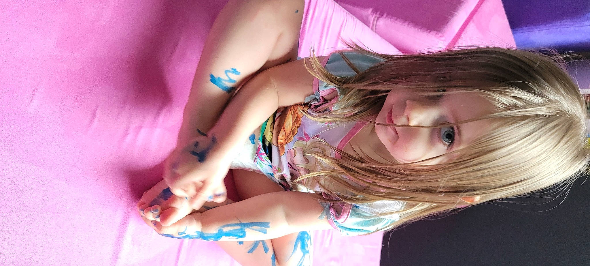Isabella is registered to the contest to win money with this photo: arm, black_hair, elbow, eyebrow, eyelash, finger, gesture, hand, happy, human, human_body, joint, leg, lip, mouth, nail, neck, person, pink, skin