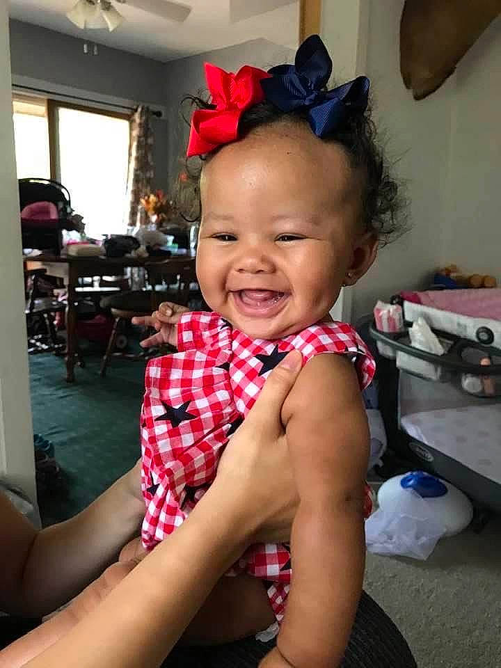 Zamia is registered to the contest to win money with this photo: arm, black_hair, cheek, child, ear, face, fashion_accessory, finger, hair, hairstyle, hand, head, joy, leg, neck, person, skin, thumb, toddler