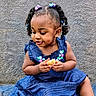 toddler, child, girl, braids, hair_bows, blue_dress, sitting, snack, food, dimples, happy, cute, portrait, outdoor, texture, wall, skin, smile, hands, young_child