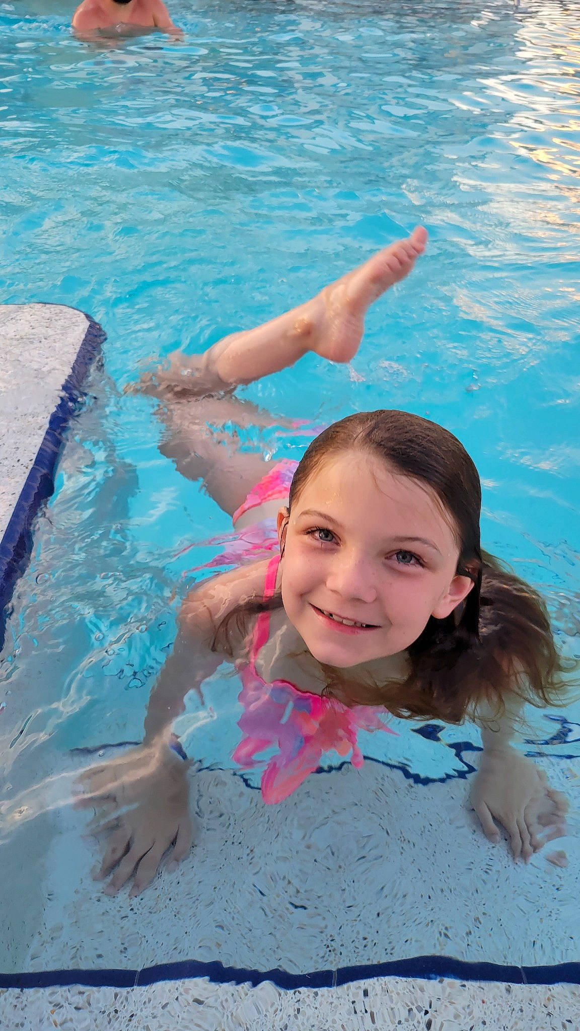 Leighanna is registered to the contest to win money with this photo: azure, child, fun, happy, joy, leisure, mammal, outdoor_recreation, people, people_in_nature, people_on_beach, person, photograph, pink, recreation, smile, summer, swimming_pool, thigh, toddler