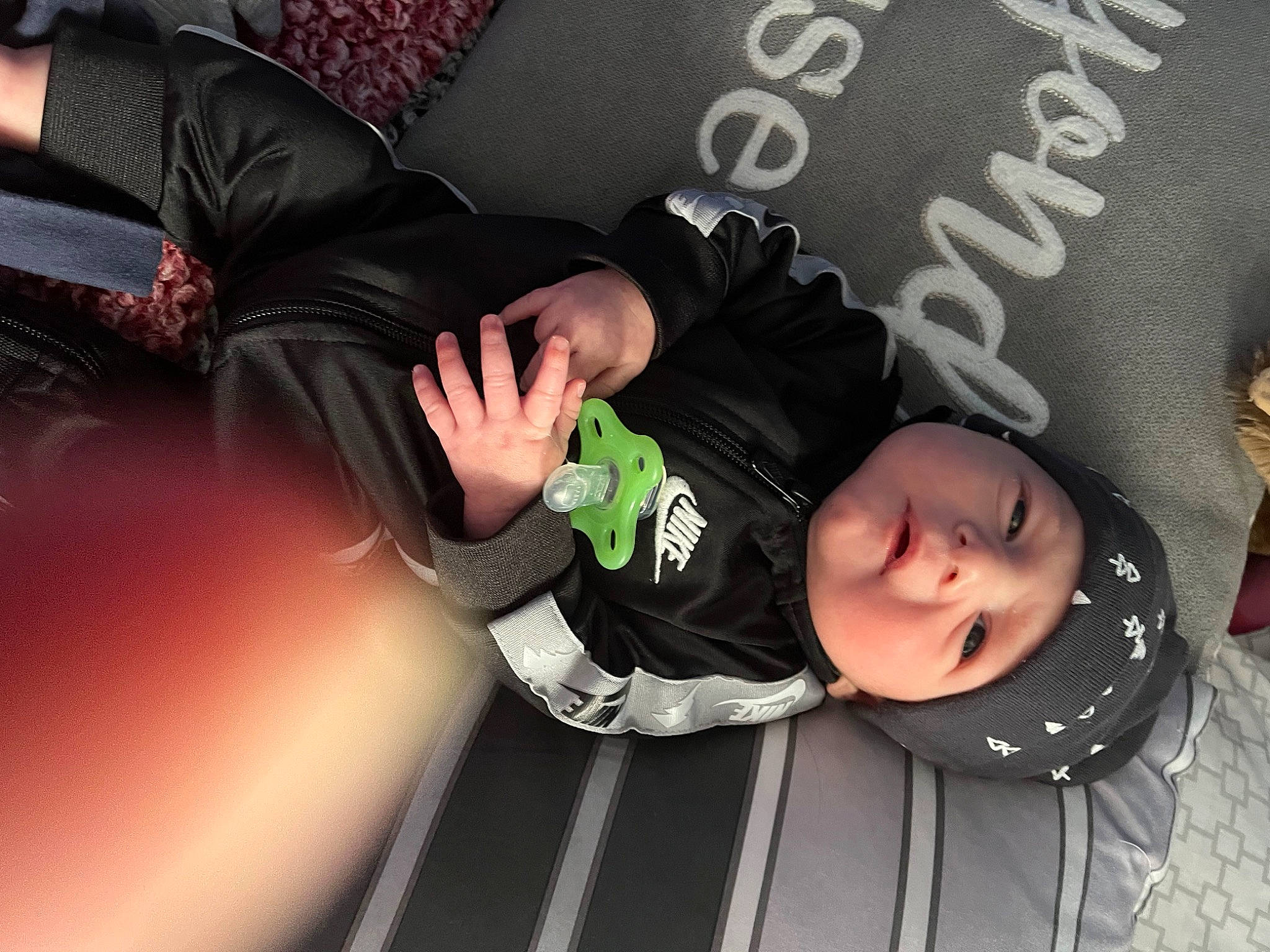 Christian Joseph joined the competition — help win amazing prizes! baby, baby_toddler_clothing, child, comfort, cool, flash_photography, flooring, font, fun, grass, headwear, knee, linens, logo, pattern, person, room, sitting, sleeve, t_shirt