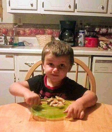 Bentley joined the competition — help win amazing prizes! cabinetry, chair, comfort_food, cooking, countertop, cuisine, face, food, food_craving, home_appliance, ingredient, kitchen, kitchen_appliance, microwave_oven, person, plate, smile, t_shirt, table, tableware