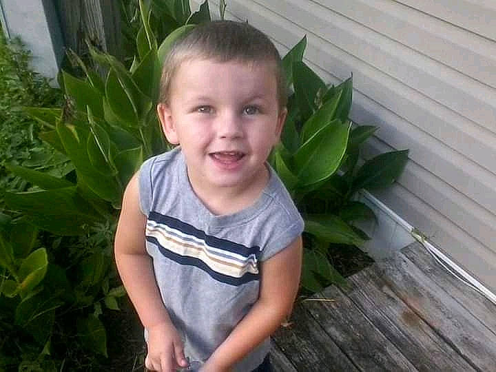 Bentley joined the competition — help win amazing prizes! child, eye, face, facial_expression, flowerpot, grass, grass_family, hair, hairstyle, happy, houseplant, iris, joy, people_in_nature, person, plant, sleeve, smile, terrestrial_plant, toddler