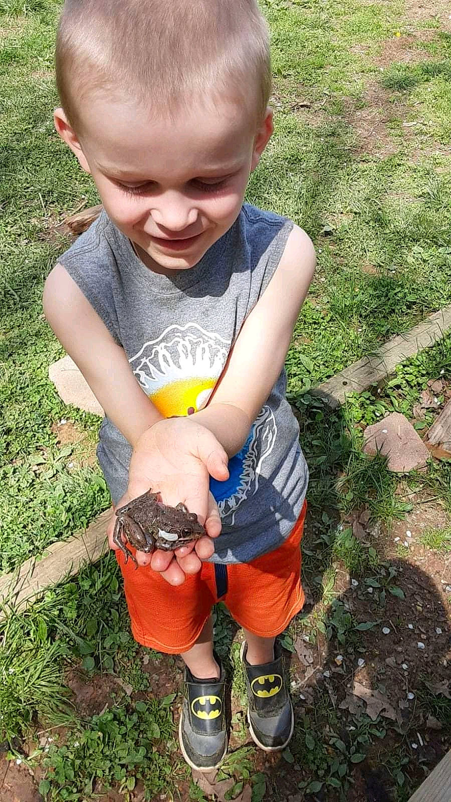 Kenneth joined the competition — help win amazing prizes! baby_toddler_clothing, child, electric_blue, finger, fun, grass, hand, happy, lawn, leaf, people_in_nature, person, plant, recreation, shorts, sleeve, smile, soil, t_shirt, thumb