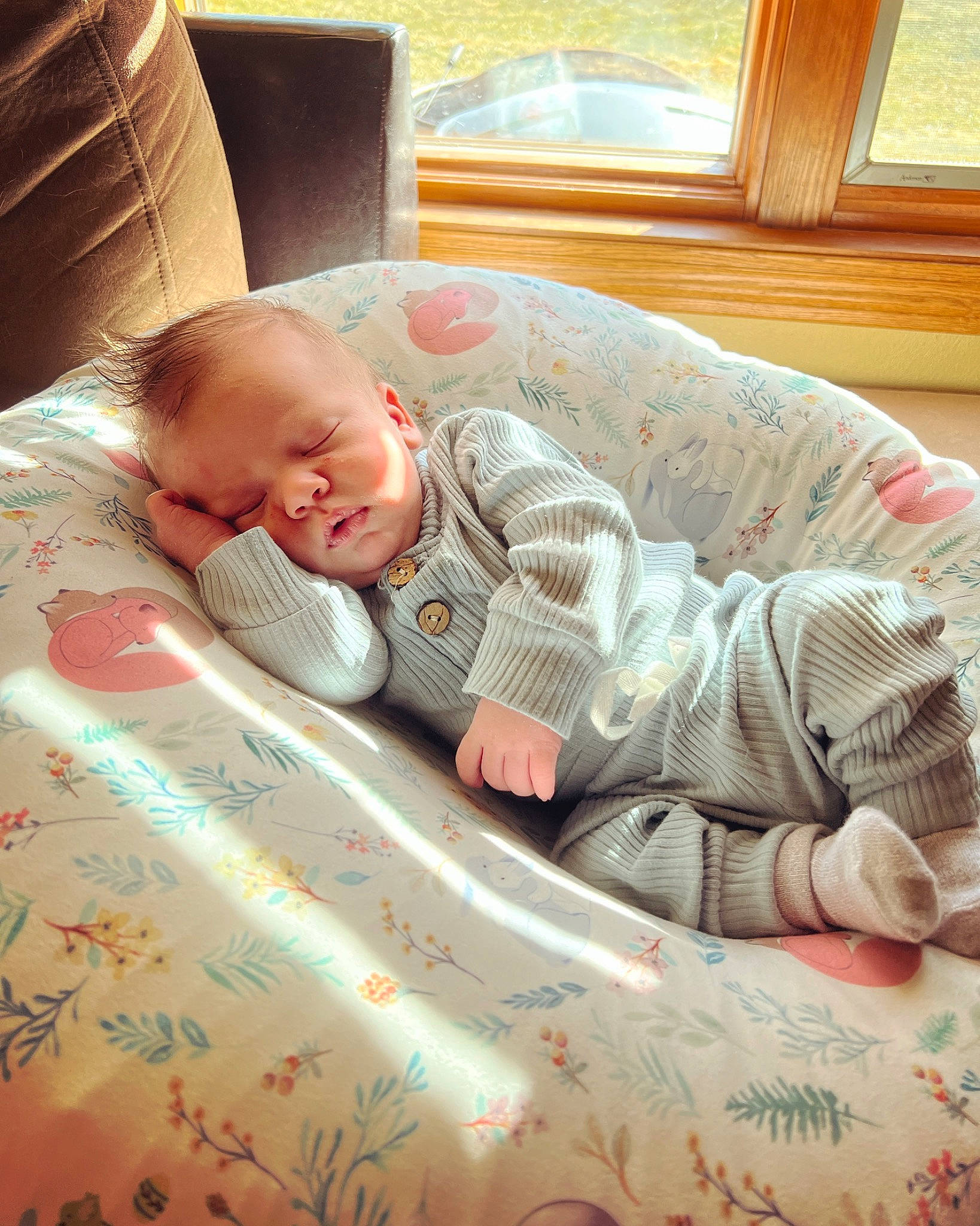 Leland joined the competition — help win amazing prizes! baby, baby_products, baby_toddler_clothing, bedding, bedtime, child, comfort, finger, flooring, hand, linens, mammal, mouth, person, room, sitting, skin, sleeve, t_shirt, toddler