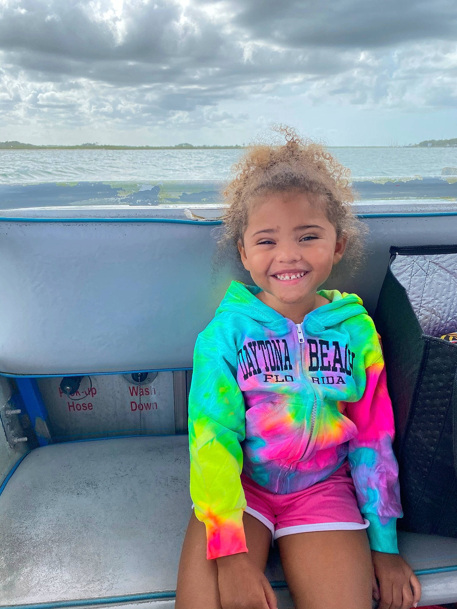 Gwendolyn is registered to the contest to win money with this photo: baby_toddler_clothing, boat, body_of_water, cloud, eye, face, fun, happy, joy, leisure, people, person, recreation, shorts, skin, sky, smile, summer, thigh, toddler