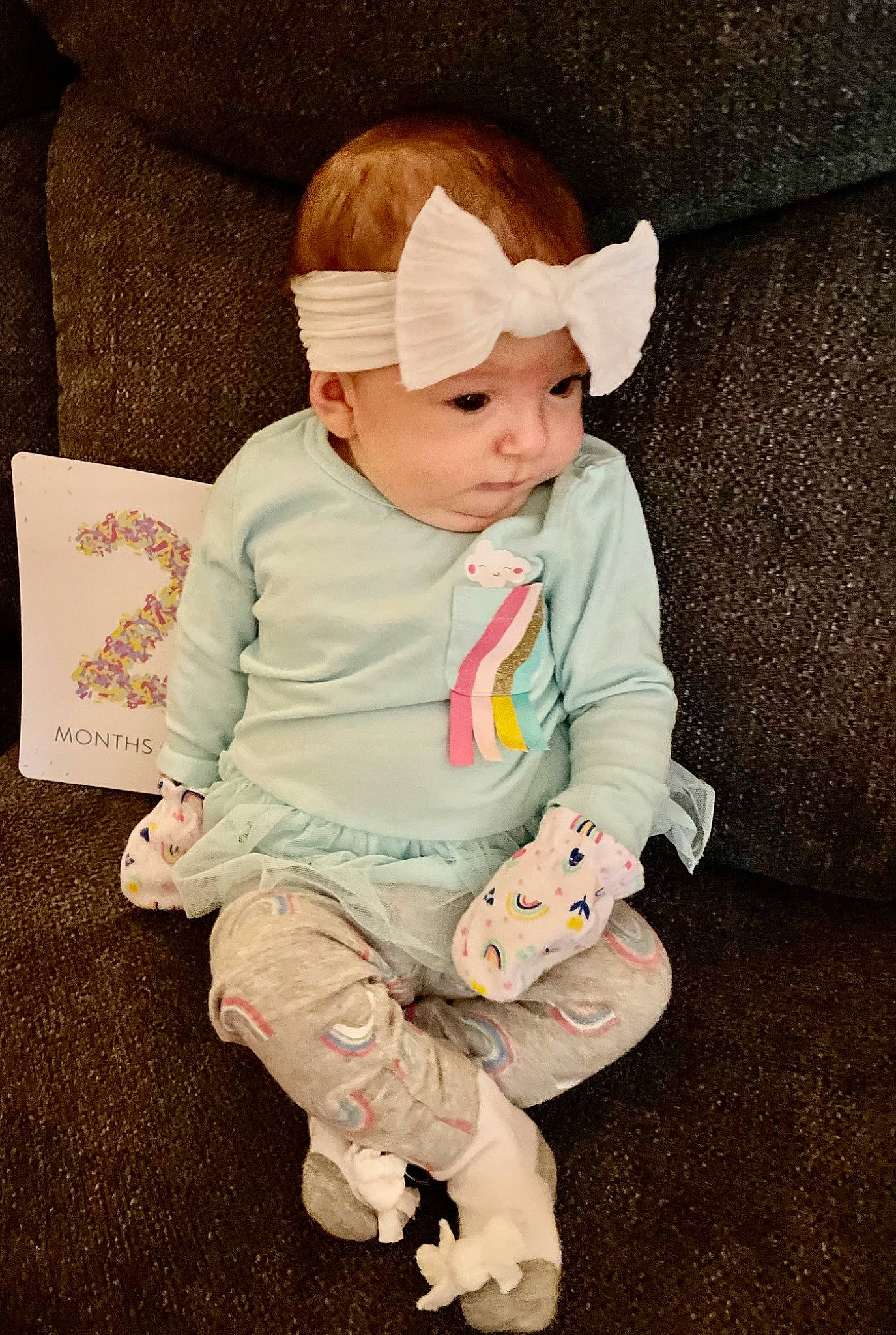 Jayla is registered to the contest to win money with this photo: baby, baby_toddler_clothing, cap, cheek, child, comfort, eye, face, fashion_accessory, fun, grass, happy, head, headwear, human_body, person, portrait_photography, sitting, skin, sleeve