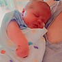 Nathan is registered to the contest to win money with this photo: baby, newborn, sleeping, blanket, polka_dot, infant, face, hand, nasal_tube, resting, close_up, soft_light, adult, skin, comfort, tender, care, hospital, love, peaceful