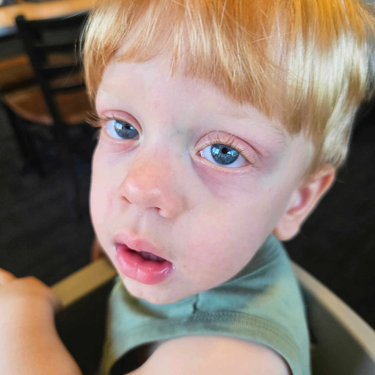 Jadeyn joined the competition — help win amazing prizes! background_blur, blonde_hair, blue_eyes, casual_clothing, chair, child, close_up, expression, eyelashes, face, green_shirt, indoor, mouth, nose, person, portrait, sitting, skin, tired_look, young_child
