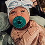 Ayda joined the competition — help win amazing prizes! baby, infant, pacifier, hat, bow, pink_clothing, heart_pattern, close_up, cute, child, newborn, apparel, face, headwear, person, indoor, soft_lighting, baby_girl, sleepwear, cozy
