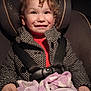baby, bodypart, car, car_interior, carseat, clothing, coat, cushion, face, finger, hand, hat, head, homedecor, jacket, person, photography, portrait, transportation, vehicle