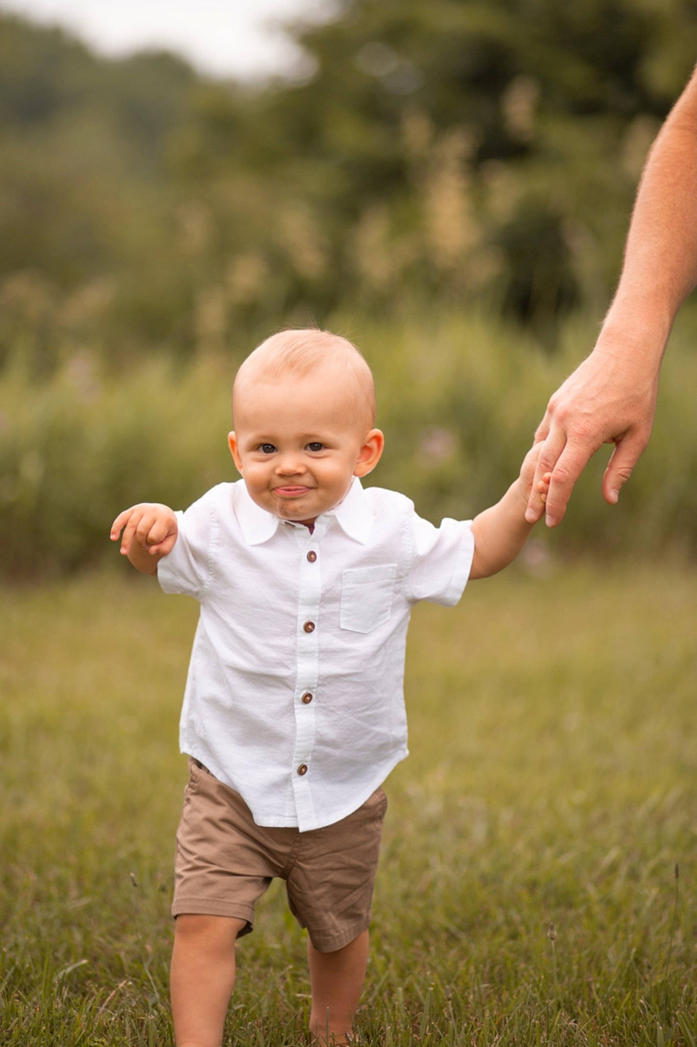 Oaklen joined the competition — help win amazing prizes! baby, child, dress, finger, flash_photography, gesture, grass, grass_family, grassland, hand, happy, joy, landscape, leaf, meadow, people_in_nature, person, plant, smile, standing