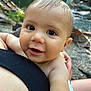 baby, child, face, eyes, smile, skin, arm, person, outdoor, nature, rock, water, stream, hand, holding, closeup, young, curious, innocent, light