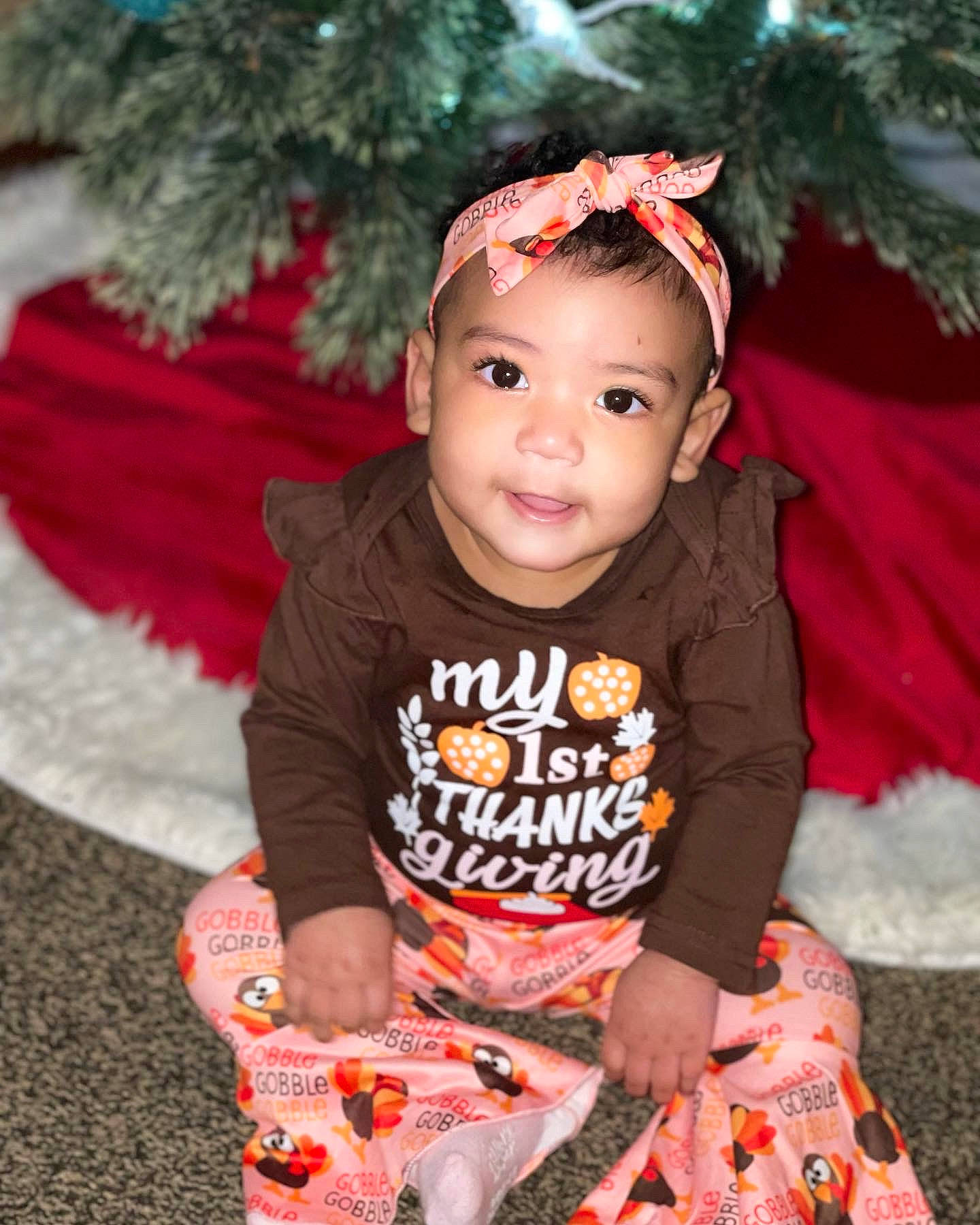 Aniya joined the competition — help win amazing prizes! baby, baby_toddler_clothing, child, costume, event, eye, fashion_accessory, flash_photography, fun, grass, happy, headband, magenta, orange, person, pink, sitting, sleeve, smile, t_shirt