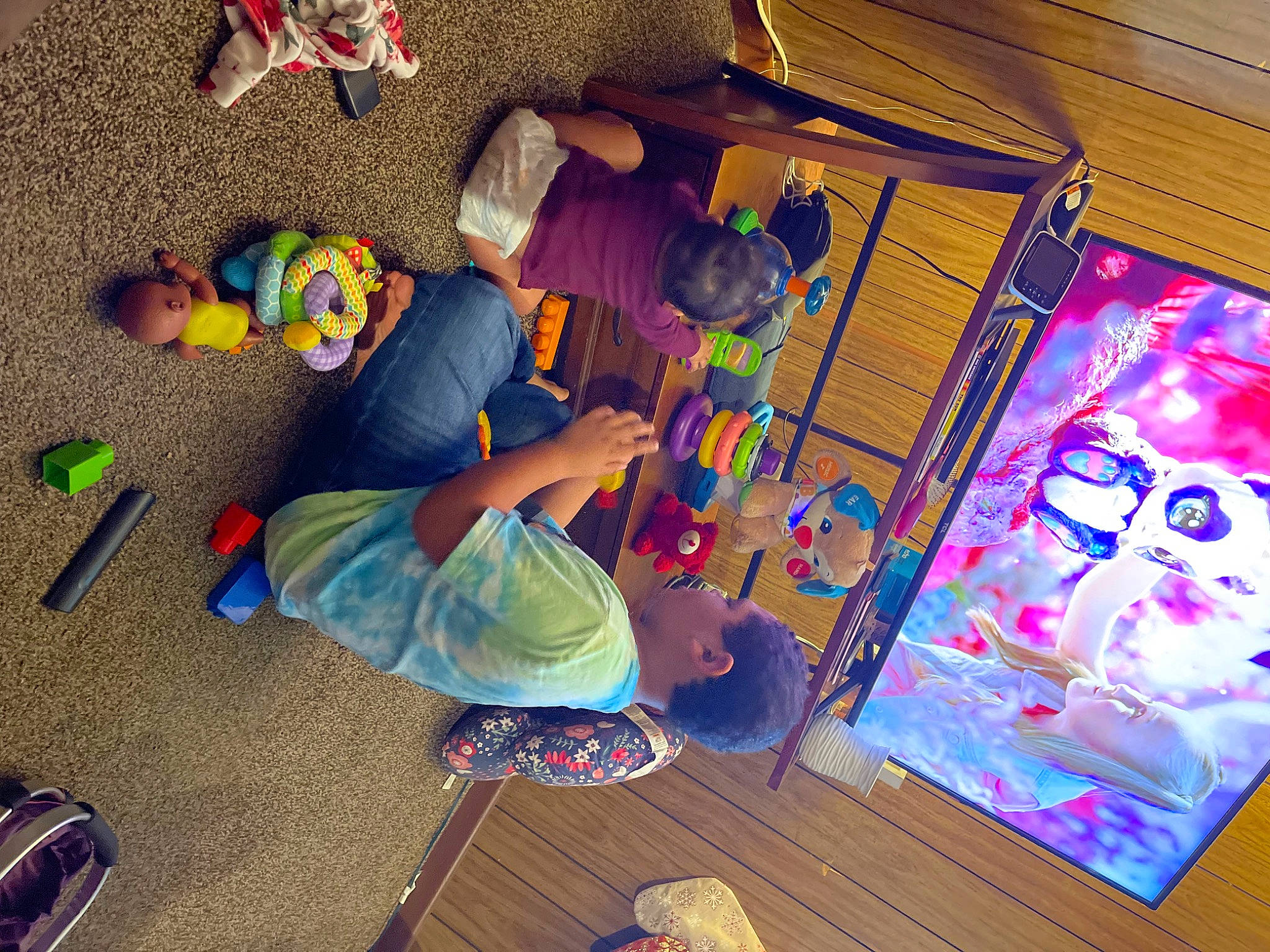 Aniya is registered to the contest to win money with this photo: art, baby, child, event, flooring, fun, hardwood, hat, leisure, magenta, person, play, purple, room, shoe, sneakers, t_shirt, toddler, toy, visual_arts