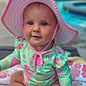 baby, child, hat, sunhat, swimsuit, poolside, towel, outdoor, summer, cute, sitting, colorful_clothing, infant, playful, skin, face, blue_eyes, legs, hand, sun_protection