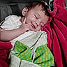 baby, blanket, car_seat, child, close_up, cozy, face, finger, green_blanket, hand, indoors, infant, peaceful, photography, pink_blanket, portrait, resting, sleeping, sleepy, white_clothing