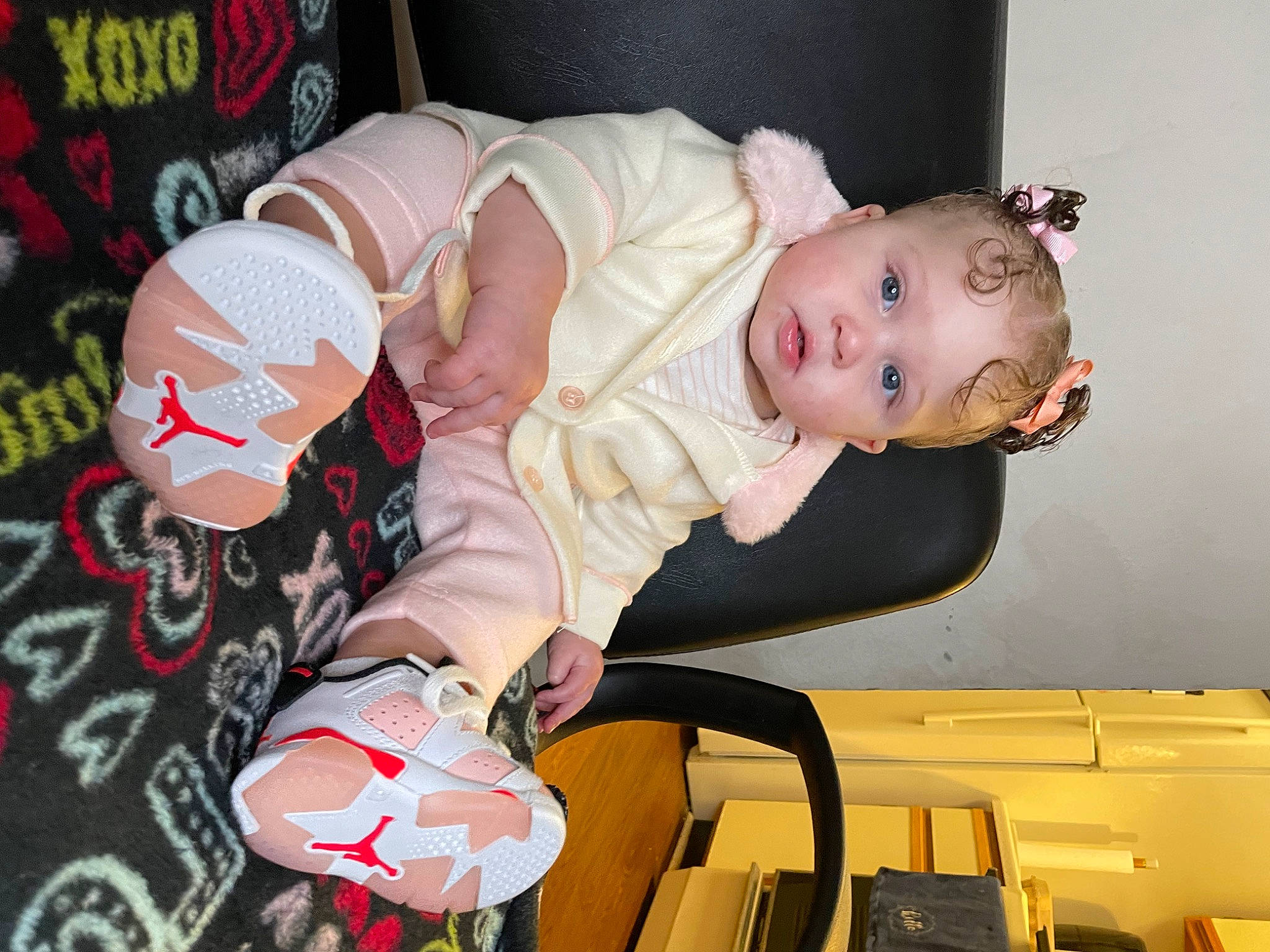 Rylie joined the competition — help win amazing prizes! baby, baby_products, baby_safety, baby_toddler_clothing, carmine, child, comfort, finger, fun, mammal, person, pink, product, room, sitting, toddler