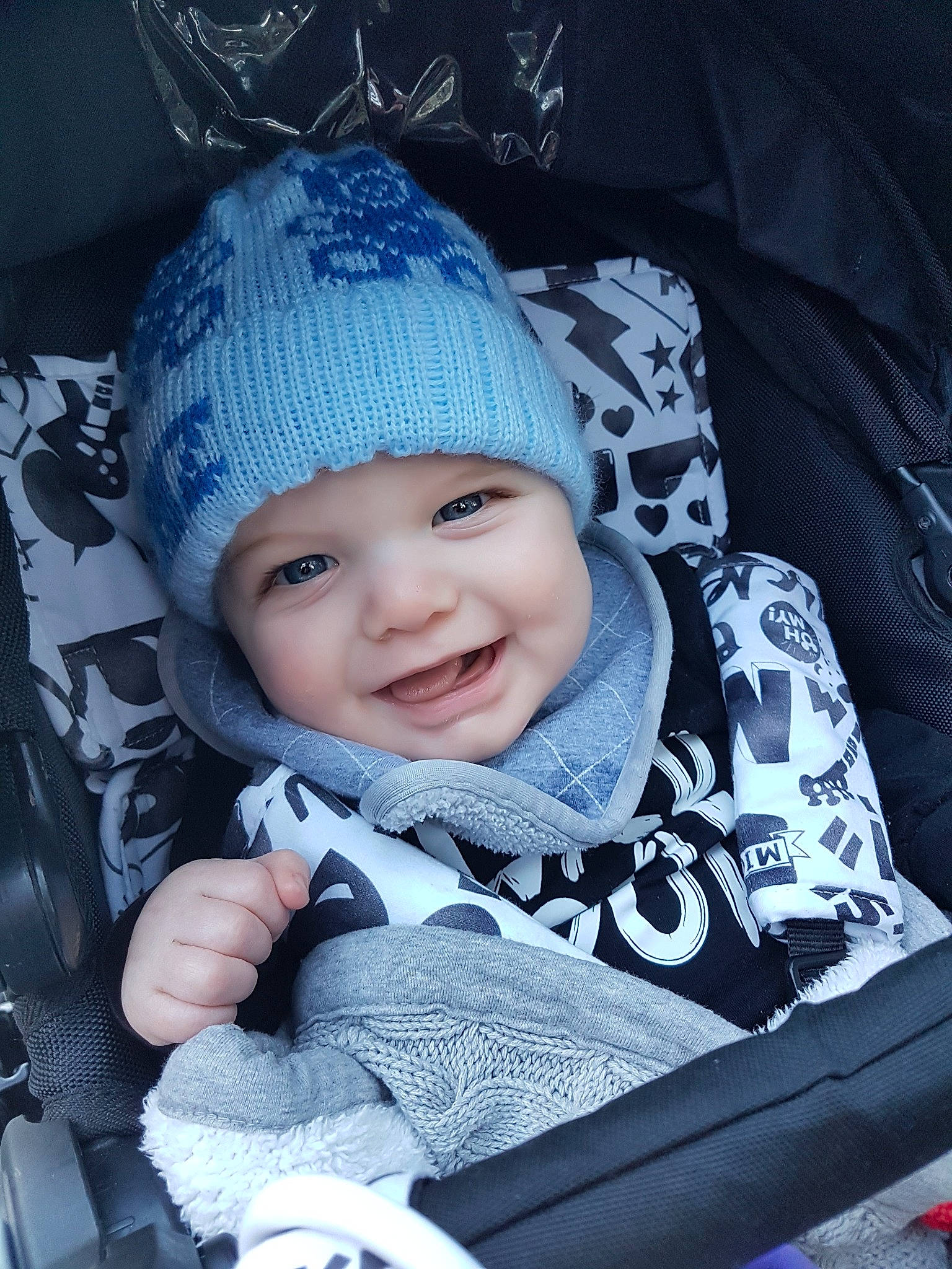Cruz is registered to the contest to win money with this photo: baby, baby_carriage, baby_in_car_seat, baby_products, beanie, blue, bonnet, cap, car_seat, cheek, child, headgear, joy, knit_cap, knitting, person, product, smile, toddler, winter