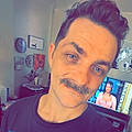 Travis Mitchell C.